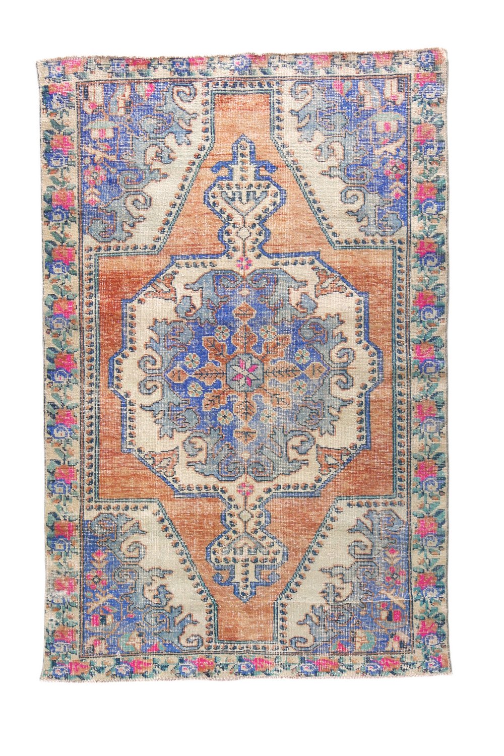 'Bethel' Vintage Turkish Rug - 4'6.5" x 7'5" - Canary Lane
Vintage handwoven Turkish area rug showcasing an intricate floral and medallion pattern. The design features rich, vibrant colors like cream, pink, blue, and peach, with a detailed floral border. Its luxurious texture and classic style bring sophistication and warmth to any space.