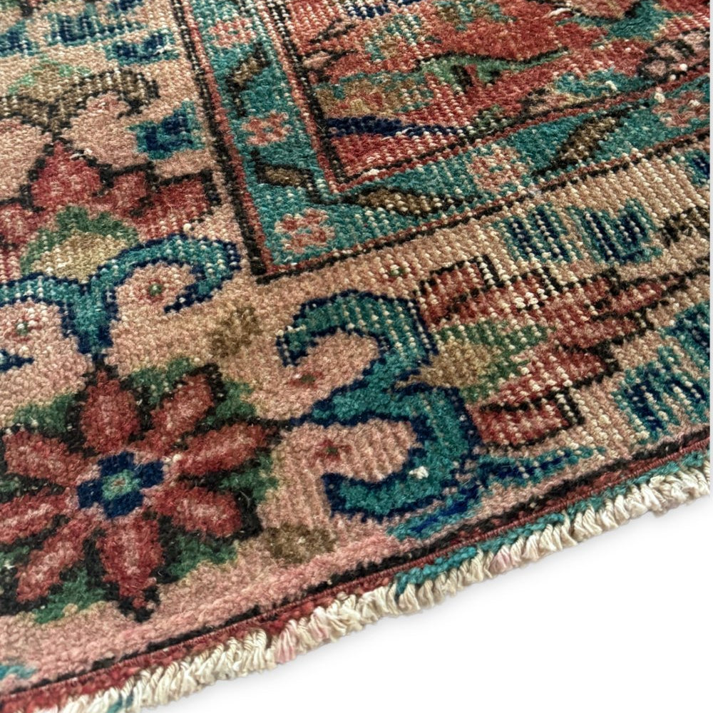 
                  
                    'Cardinal' Vintage Turkish Rug - 5'1.5" x 8'11.5" - Canary Lane
Close up of a vintage handwoven Turkish area rug featuring intricate floral motifs with detailed borders. The design incorporates red, teal, blue, and cobalt, blending warm tones for a harmonious look. Its rich texture and timeless aesthetic add depth and elegance, making it a perfect focal point for any room.
                  
                