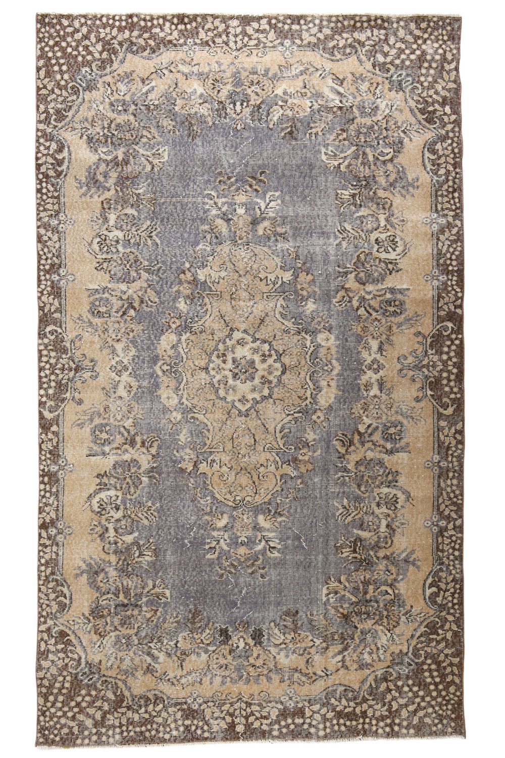 'Diggs' Vintage Turkish Rug - 5'8" x 9'6" - Canary Lane
Vintage handwoven Turkish area rug with an intricate medallion and warm tones. Features floral designs in lavender, cream, and tan. A timeless piece that adds character and heritage to any space.