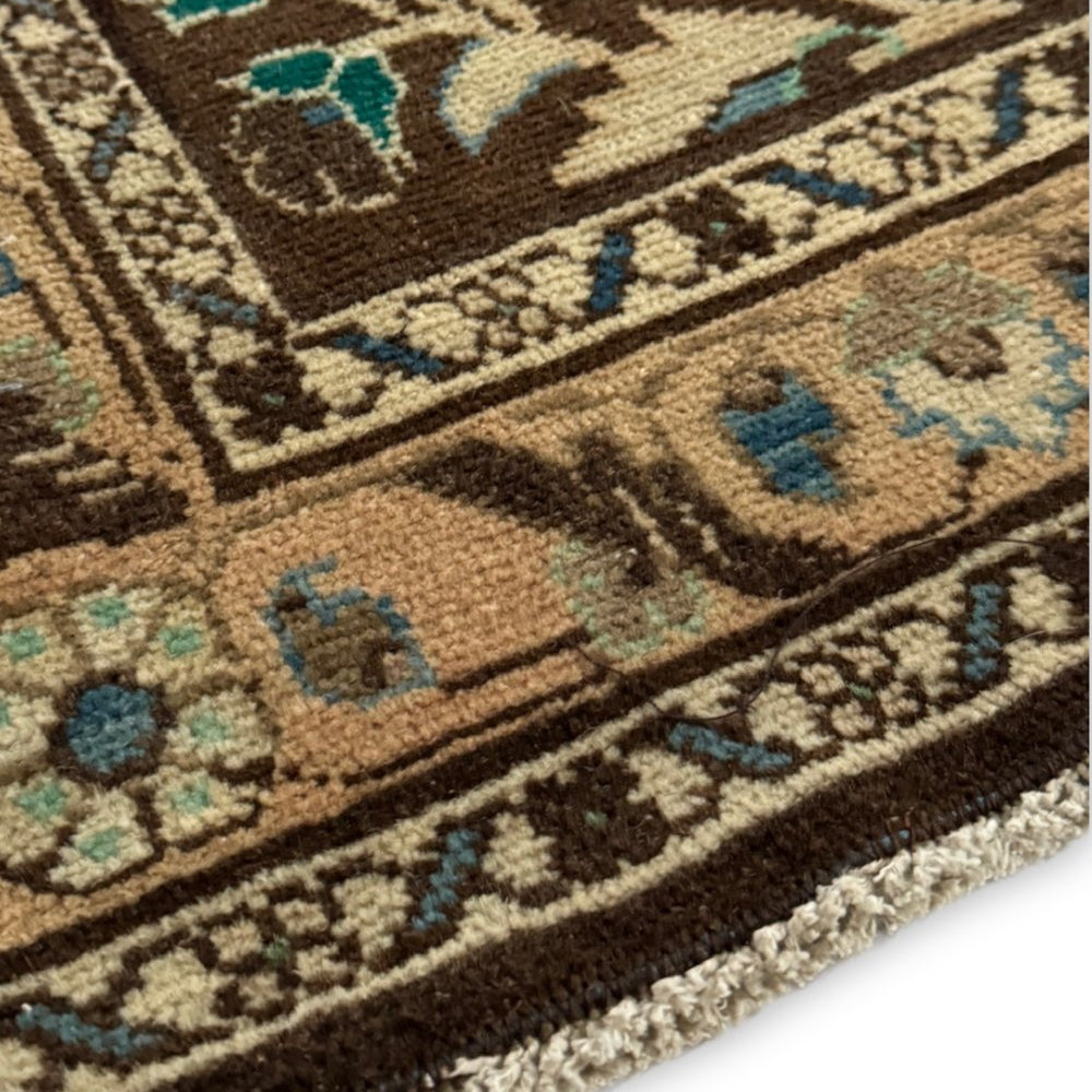 
                  
                    'Mobjack' Vintage Turkish Runner - 2'9" x 10'8.5" - Canary Lane
Close up of a vintage handwoven Turkish runner showcasing an intricate floral pattern. The design features rich, vibrant colors like pink, blue, charcoal gray, tan, and taupe, with a blend of warm and cool tones and detailed borders. Its luxurious texture and classic style bring sophistication and warmth to any space.
                  
                
