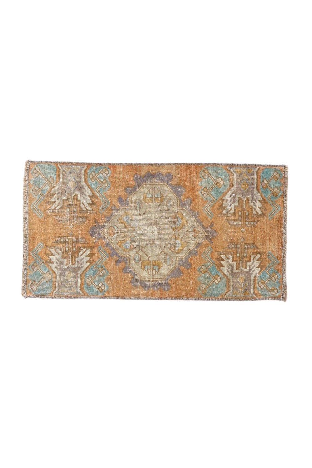 No. 1664 Mini Turkish Vintage Rug - 1'3" x 2'5" - Canary Lane
Vintage handwoven Turkish rug featuring intricate patterns and rich textures. The design showcases traditional craftsmanship with bold geometric shapes and detailed motifs. The color palette includes faded peach, lavender, brown, and teal, creating a harmonious blend of warm and cool tones. This rug is the perfect size for a bathroom, kitchen, or entryway.