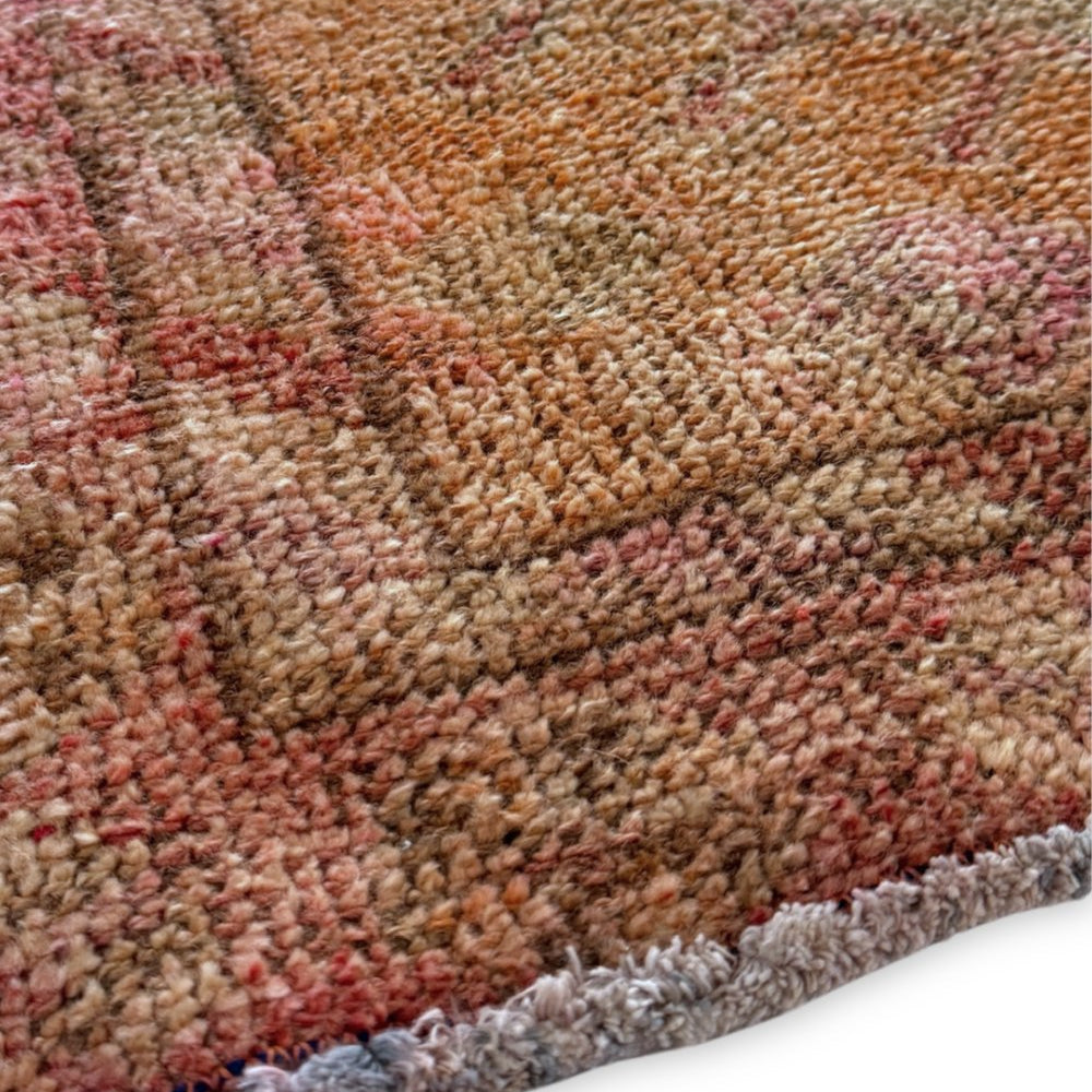
                  
                    'Seaford' Vintage Turkish Runner - 2'8.5" x 11'1" - Canary Lane
Close up of a vintage handwoven Turkish runner featuring intricate patterns and rich textures. The design showcases traditional craftsmanship with bold geometric shapes and detailed motifs. The color palette includes faded peach, tan, cream, pink, red, and gray, creating a harmonious blend of warm and cool tones.
                  
                