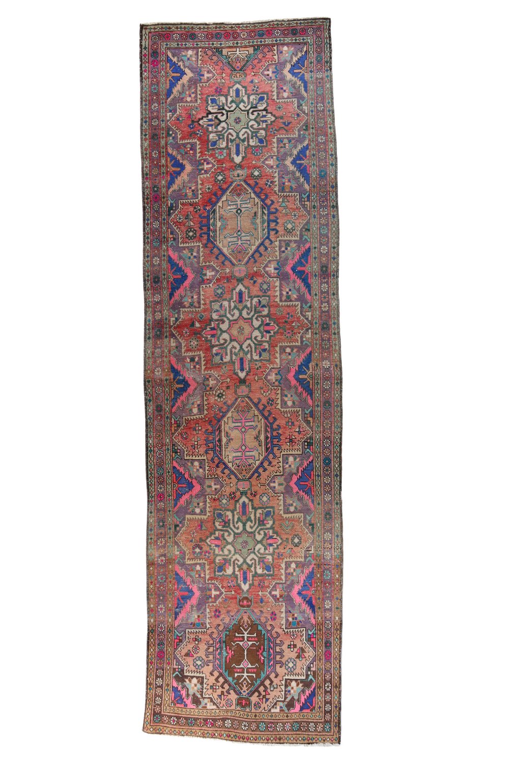 'Ware' Vintage Persian Runner - 3'2.5" x 11'10" - Canary Lane
Vintage handwoven Turkish runner showcasing intricate floral and medallion patterns. The design features rich, vibrant colors like peach, pink, purple, teal, blue, brown, with detailed borders. Its luxurious texture and classic style bring sophistication and warmth to any space.